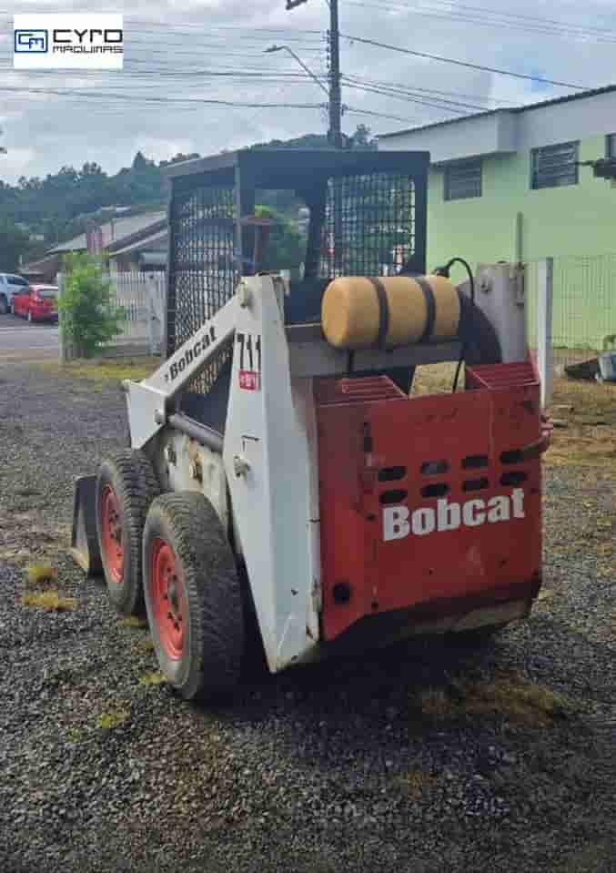Mini-Carregadeira Bobcat 711 1996