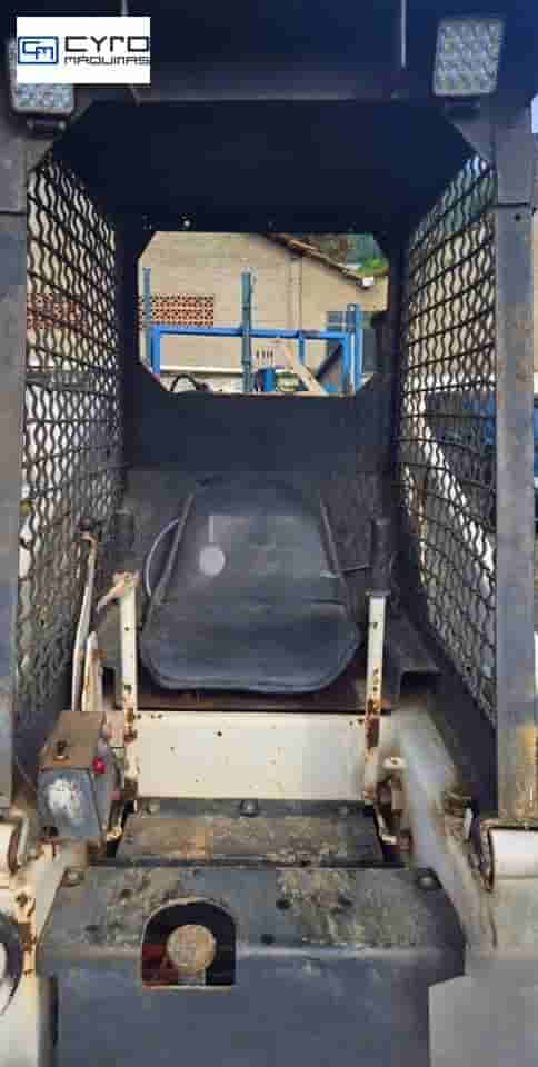 Mini-Carregadeira Bobcat 711 1996