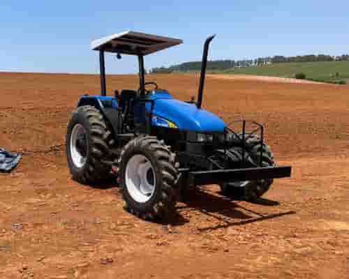 Trator New Holland TL70 99/99 - imagem de fundo