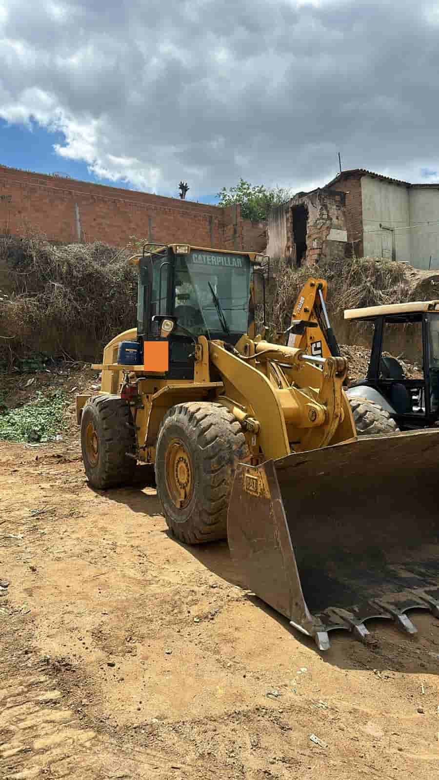 Pá Carregadeira Caterpillar 938H 2012 - imagem de fundo