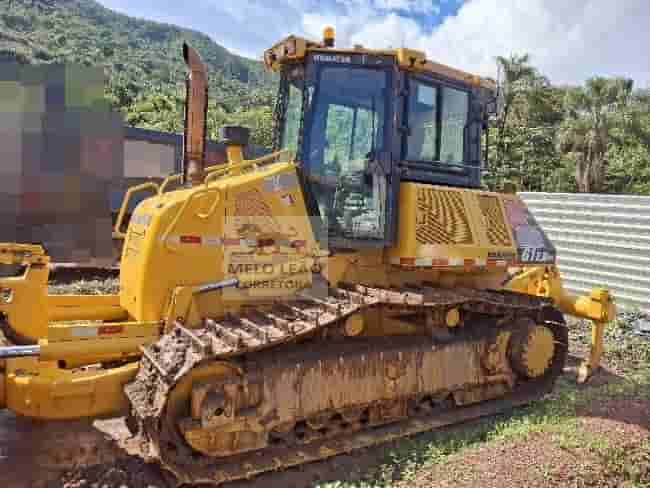 Trator de esteira Komatsu D61-EX 2021 - imagem de fundo