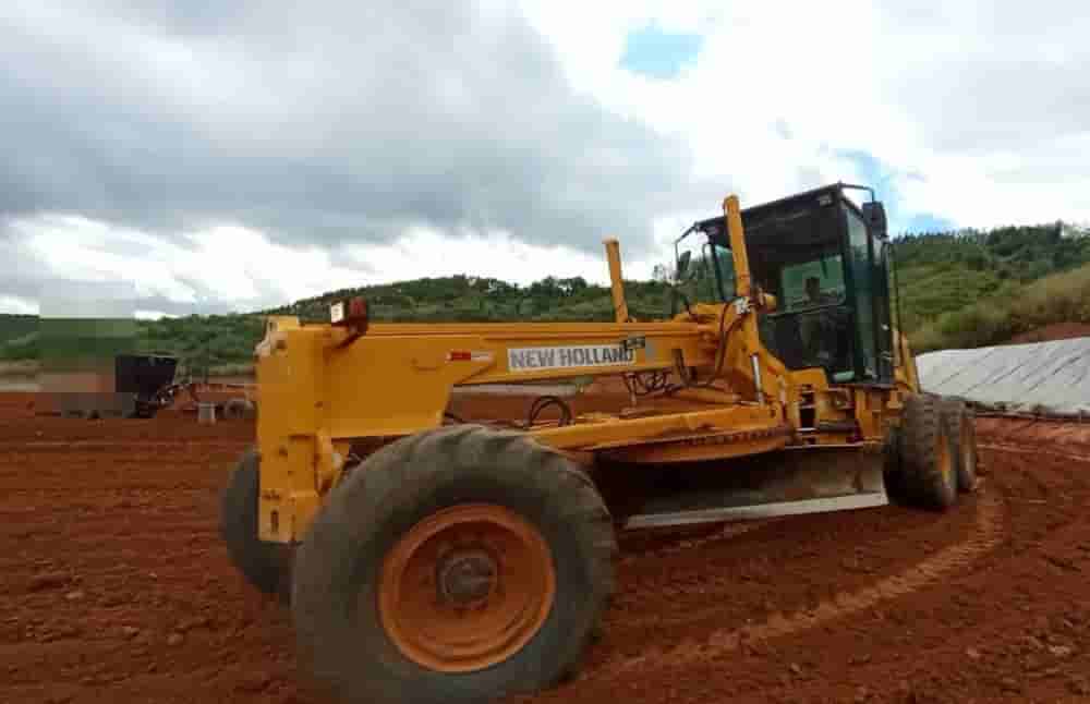 Motoniveladora New Holland RG 170B 2009 - imagem de fundo