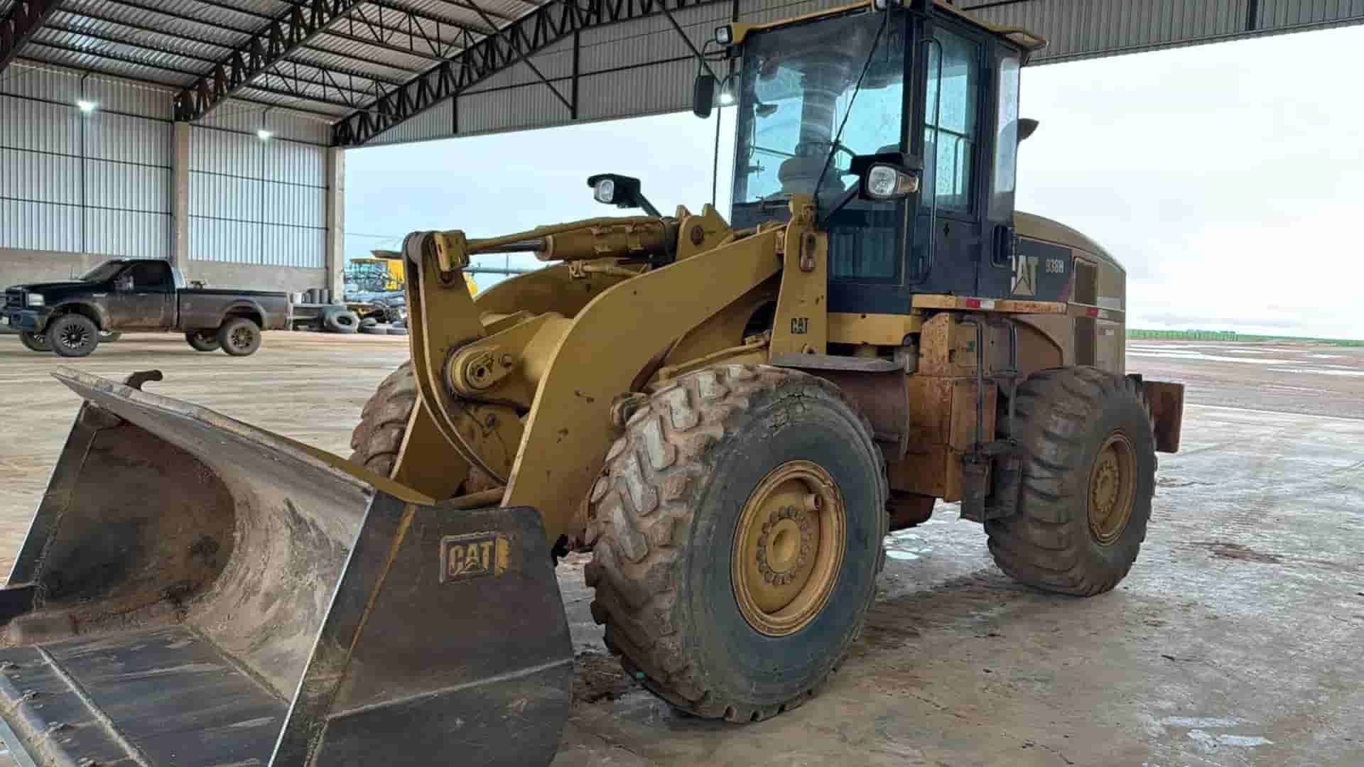 Pá Carregadeira Caterpillar 938H 2010 - imagem de fundo
