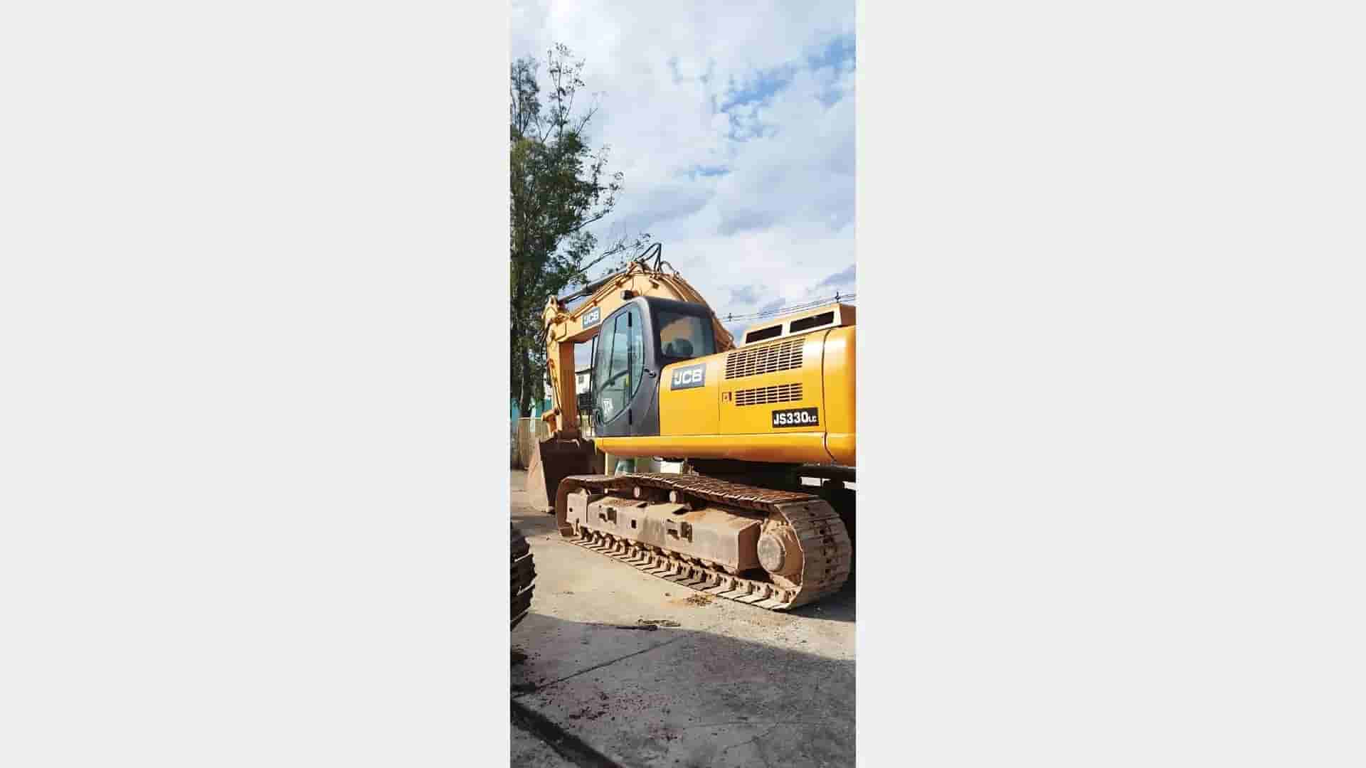 Escavadeira JCB TH10 2010 - imagem de fundo