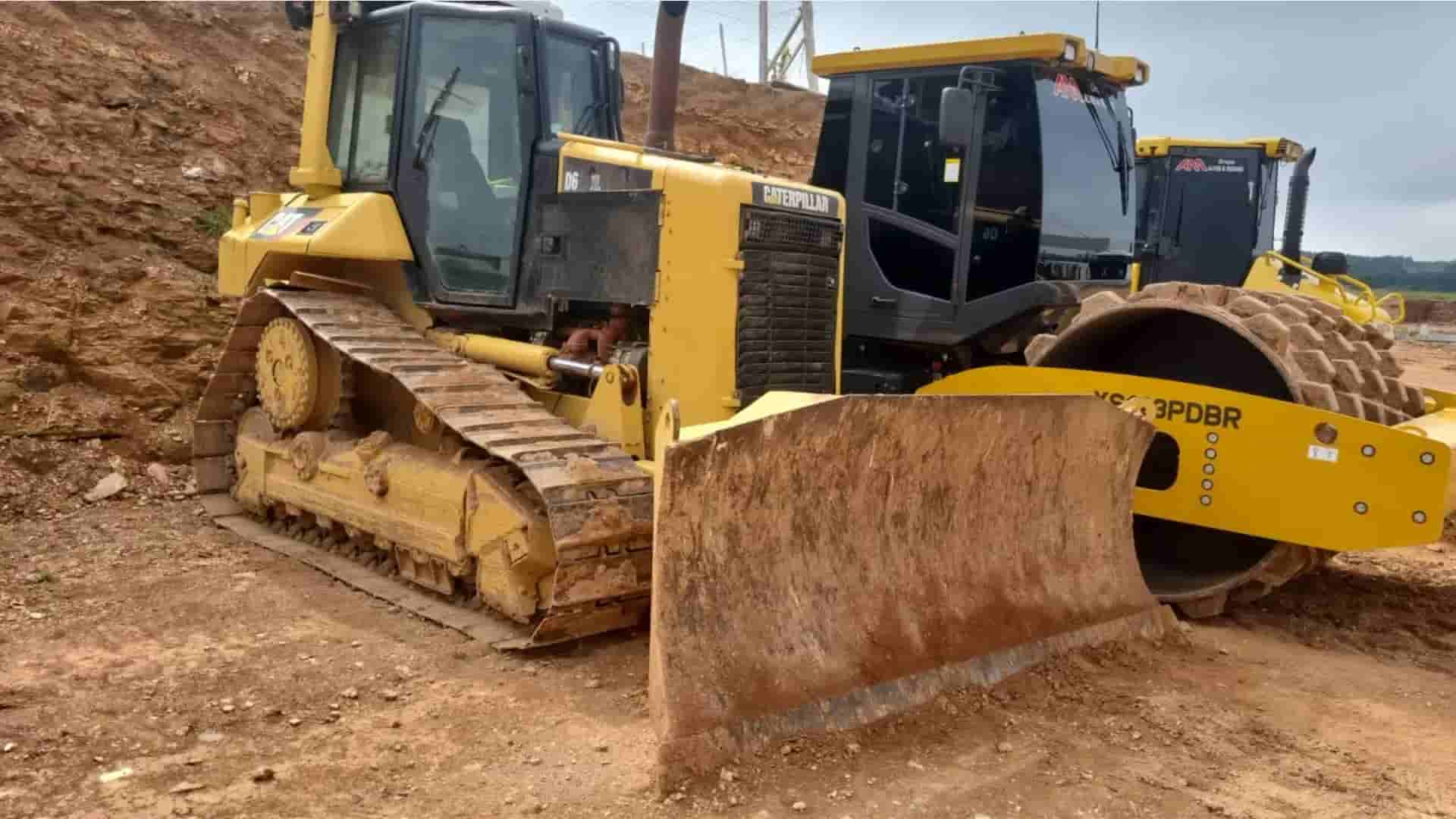 Trator de esteira Caterpillar D6NXL 2008 - imagem de fundo