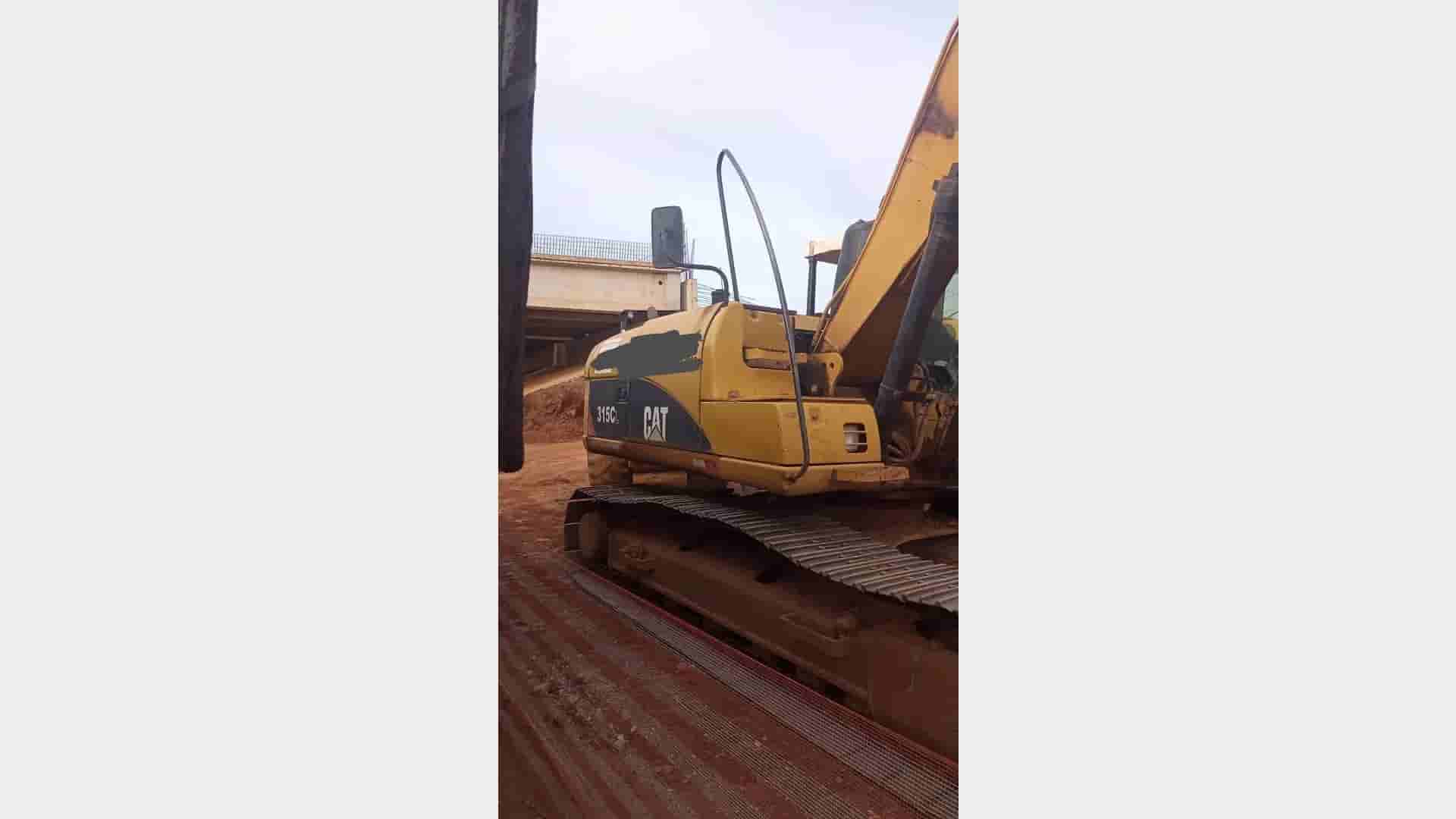 Escavadeira Caterpillar 315CL 2007 - imagem de fundo