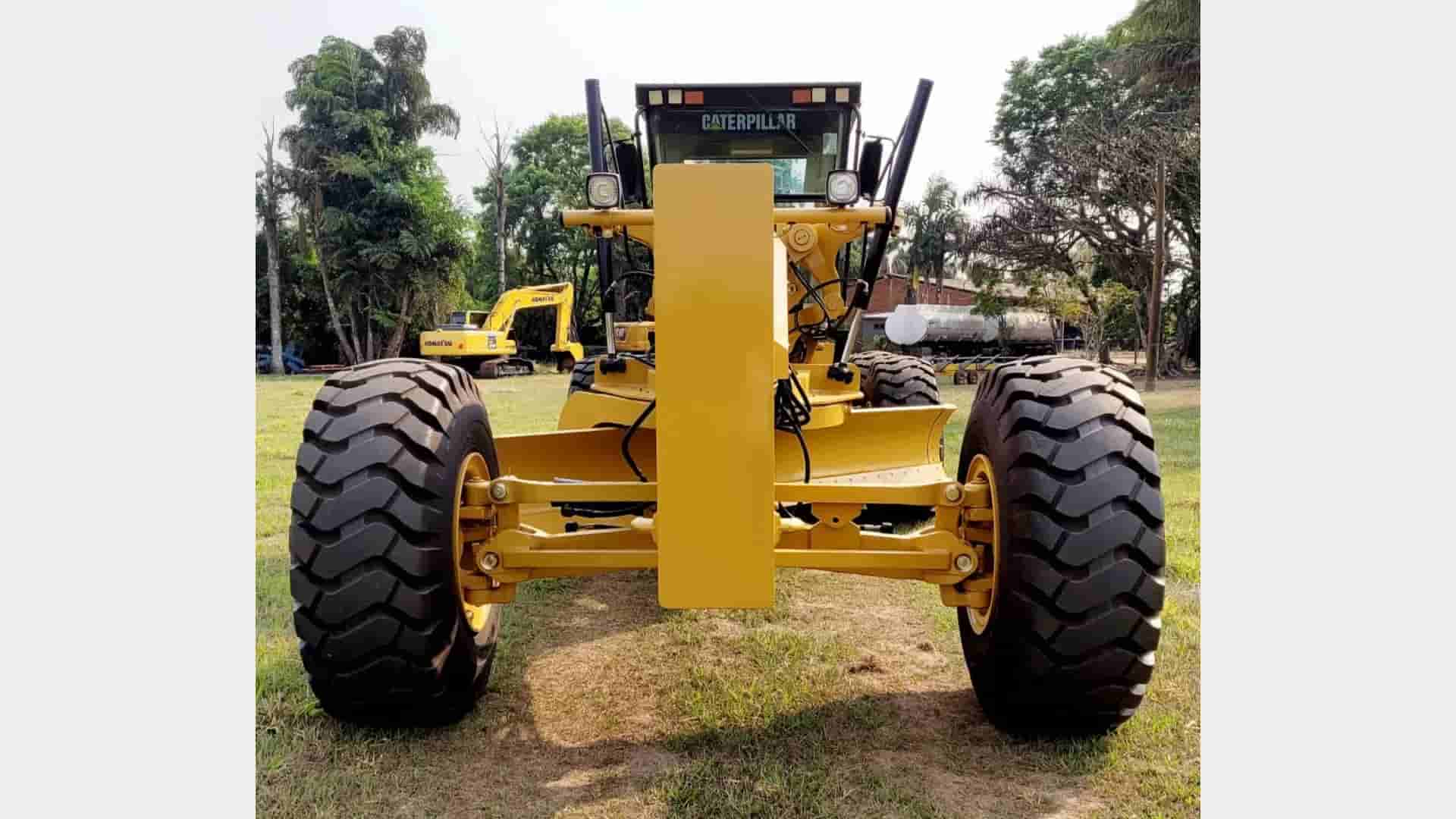 Motoniveladora Caterpillar TH10 2001 - imagem de fundo