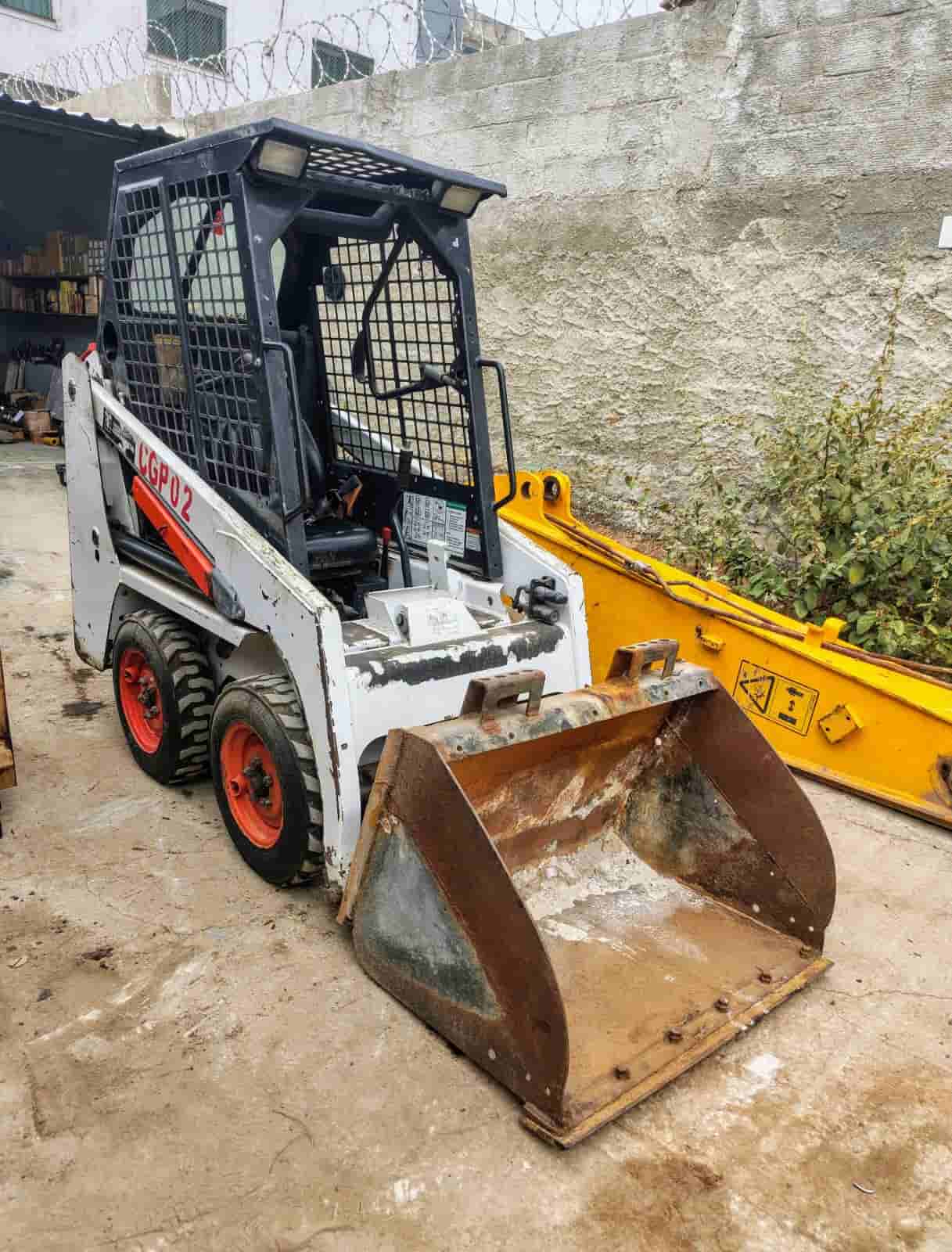 Mini Carregadeira Bobcat S70 2020 - imagem de fundo