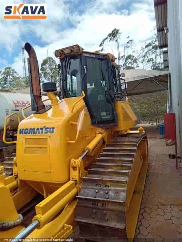 Trator de esteira Komatsu D61-EX 2018 - imagem de fundo