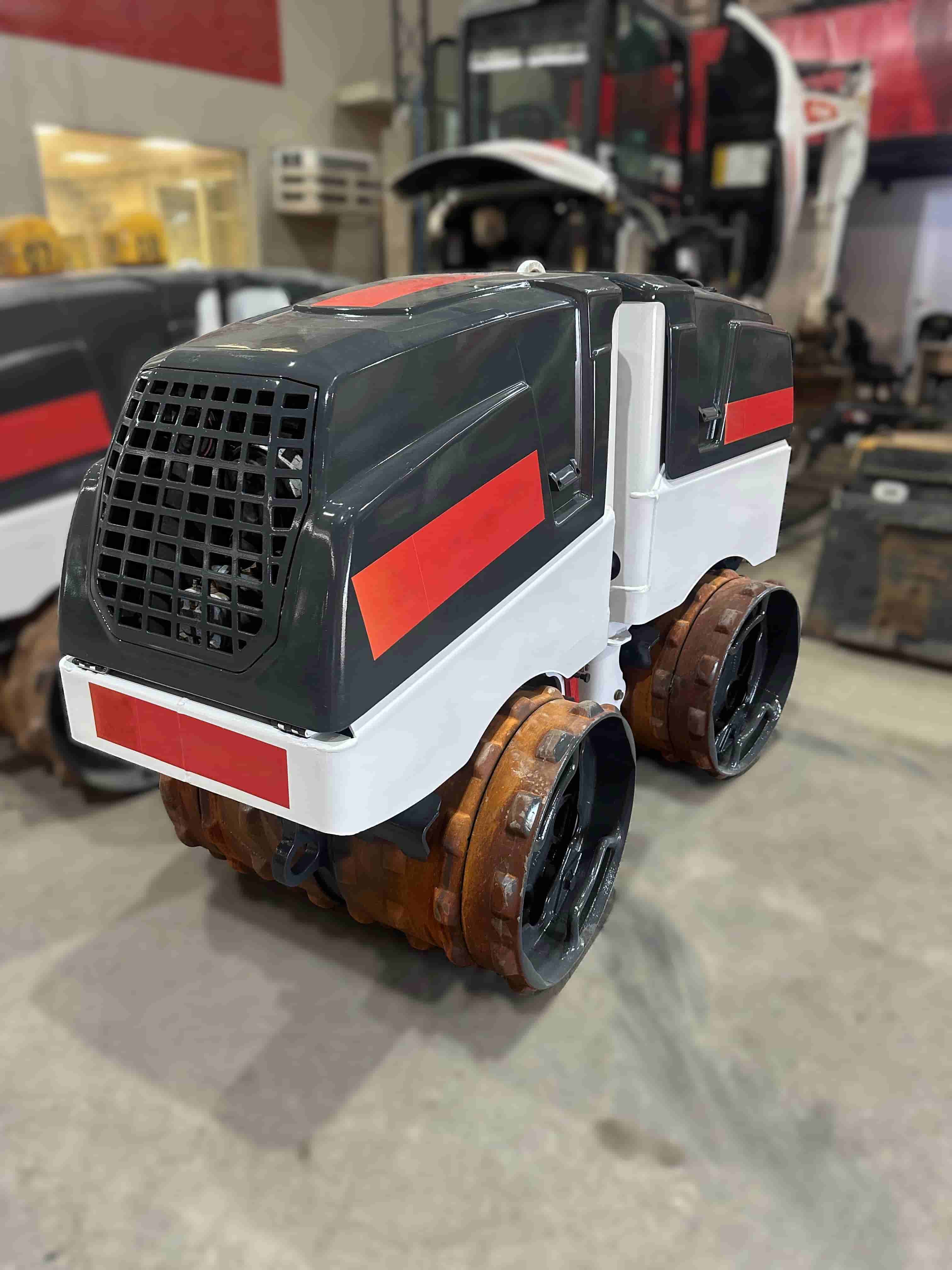 Mini Rolo Compactador Dynapac D.One 2021 - imagem de fundo
