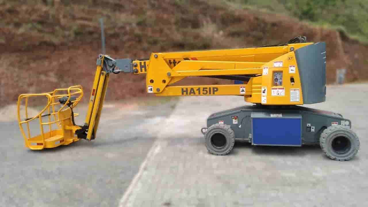 Plataforma Elevatória de Lança Haulotte HA15IP 2012 - imagem de fundo