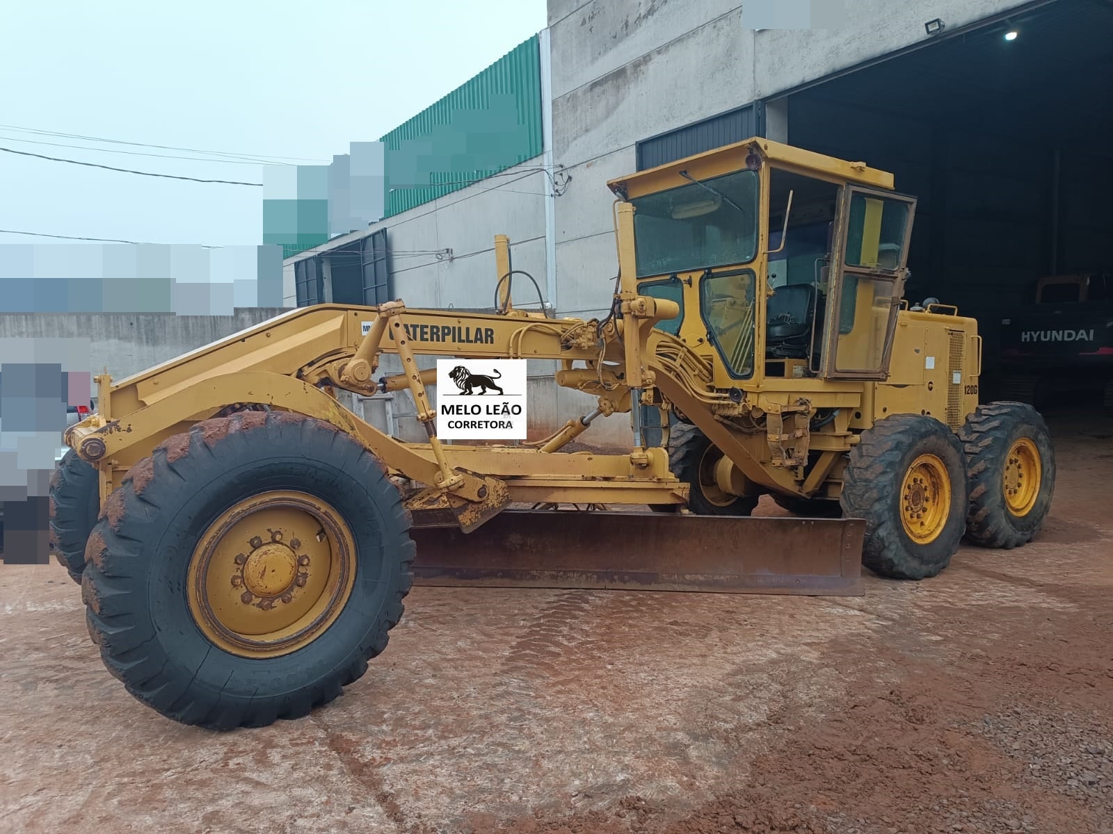 Motoniveladora Caterpillar 120G CABINE FECHADA 1996 - foto 1 de 3