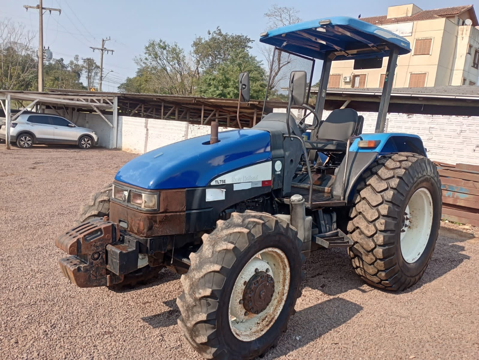 Trator agrícola New Holland TL 75E 2009 - foto 1 de 5
